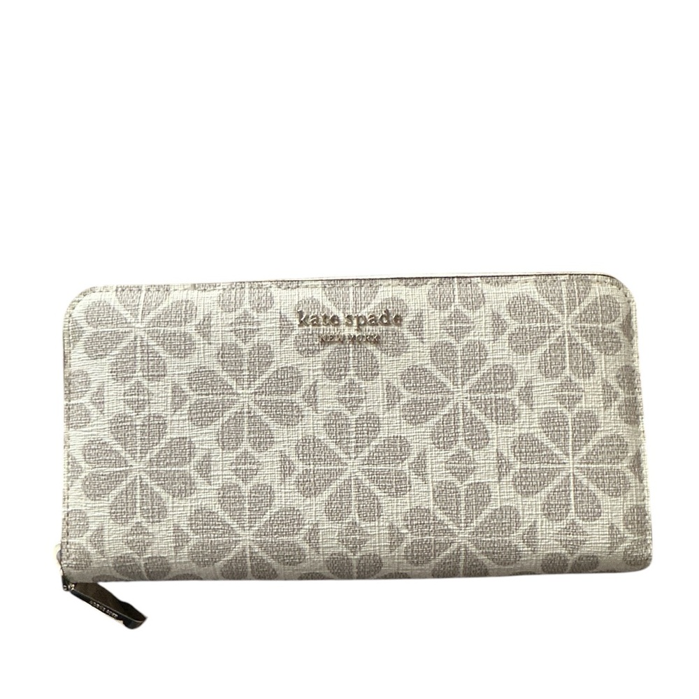 Kate spade flower coated canvas zip-around continental wallet